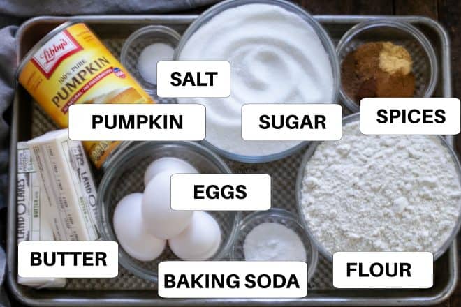 Ingredients for pumpkin bars on a metal tray with labels.