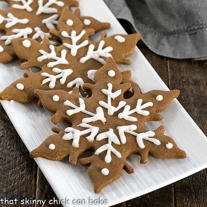 Snowflake shaped gingerbread on a white tray