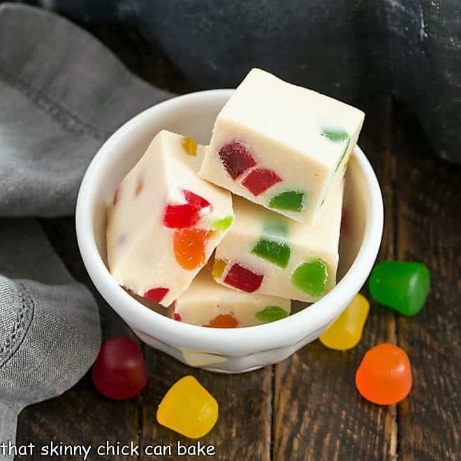 Small white bowl filled with squares of white chocolate fudge