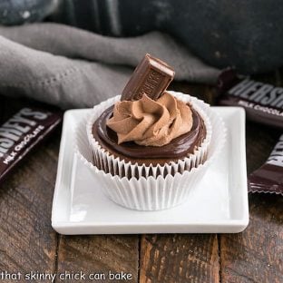 One chocolate cheesecake on a square white plate