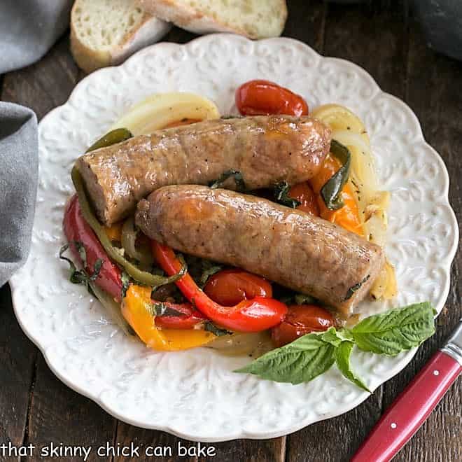 Overhead view of a plate of sheetpan sausage and peppers.