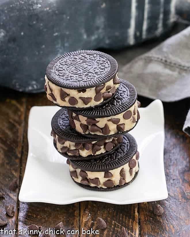 Stack of 4 Oreo Cookie Dough cookies on a rippled square plate.