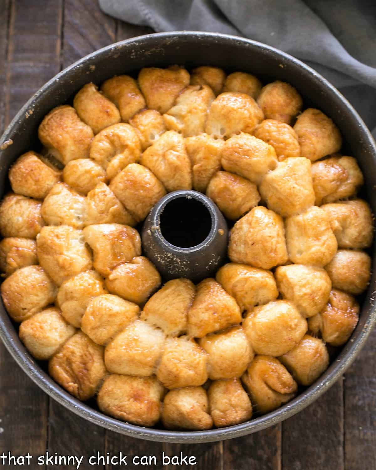 Baked bubble roll in a tube pan before inverting onto a serving dish.