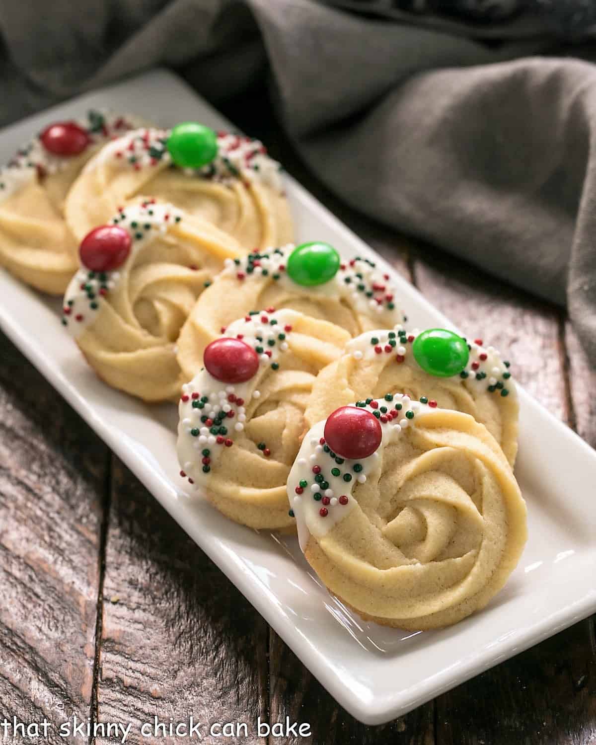 Decorated Danish Butter cookies on a white tray.