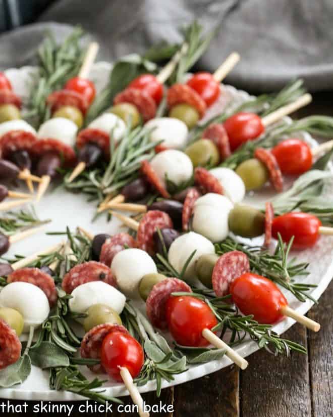 Close view of Appetizer kabobs on a round white plate
