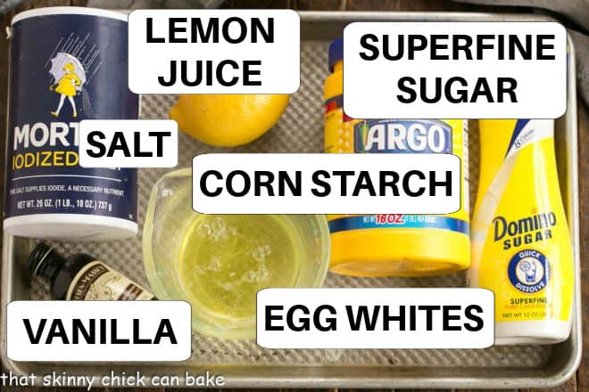 Labeled ingredients on a metal sheet pan for a wreath pavlova.