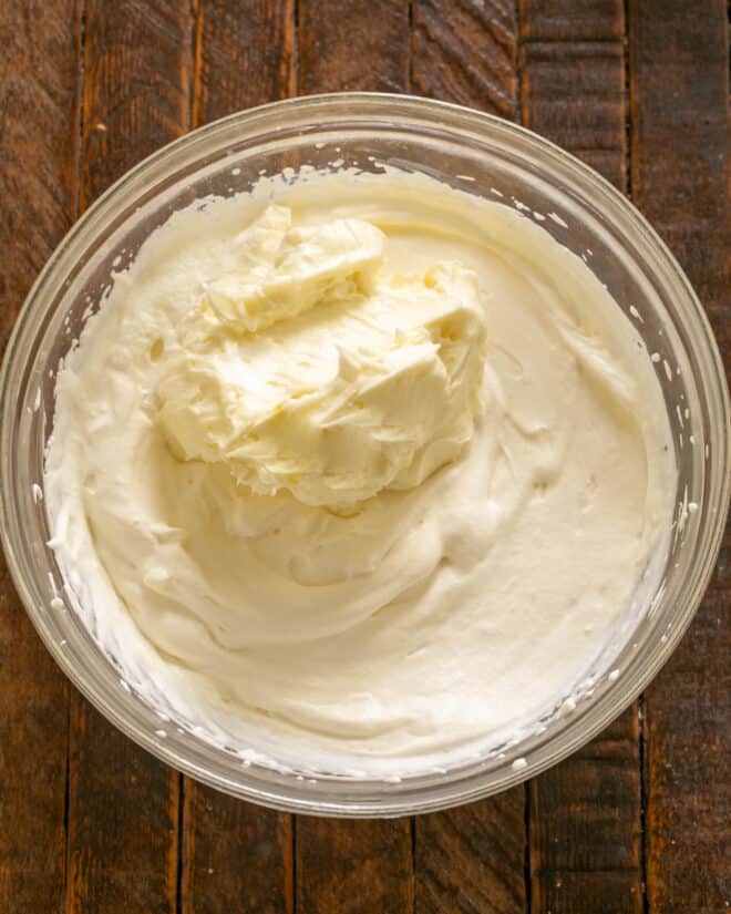 Softened cream cheese added to whipped cream.