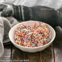 Sprinkle cookies in a shallow white ceramic bowl