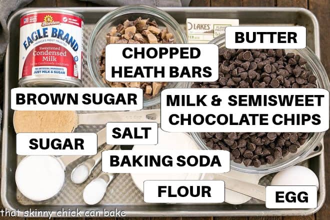 Chocolate Chip Fudge Bars ingredients with labels on a metal sheet pan.