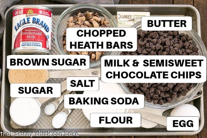 Chocolate Chip Fudge Bars ingredients with labels on a metal sheet pan.