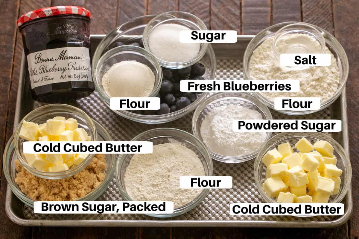 Blueberry Bars ingredients with labels on a metal sheetpan.