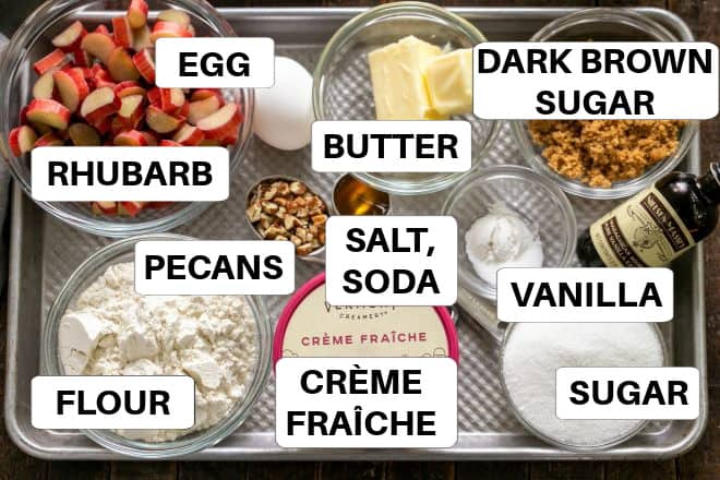 Labeled ingredients on a sheetpan for Rhubarb baby cakes.