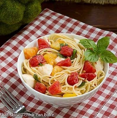 Spaghetti No-Knife in a white bowl on a red checked napkin