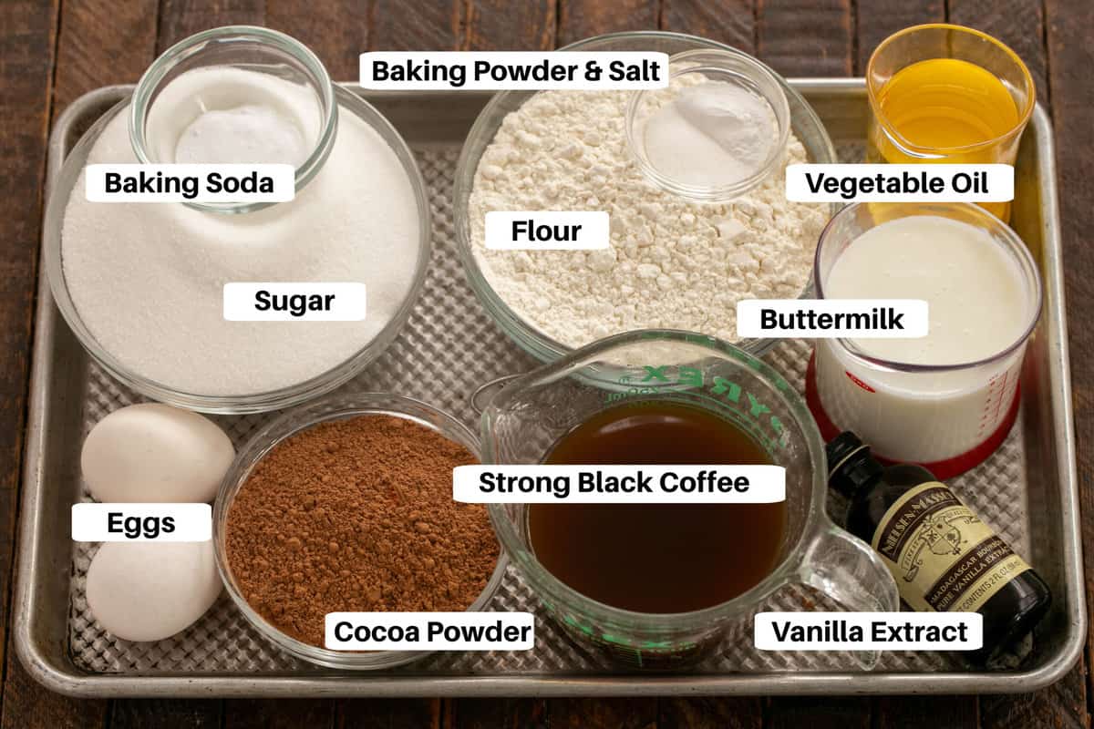 Black Magic Cake Ingredients on a sheet pan with labels.