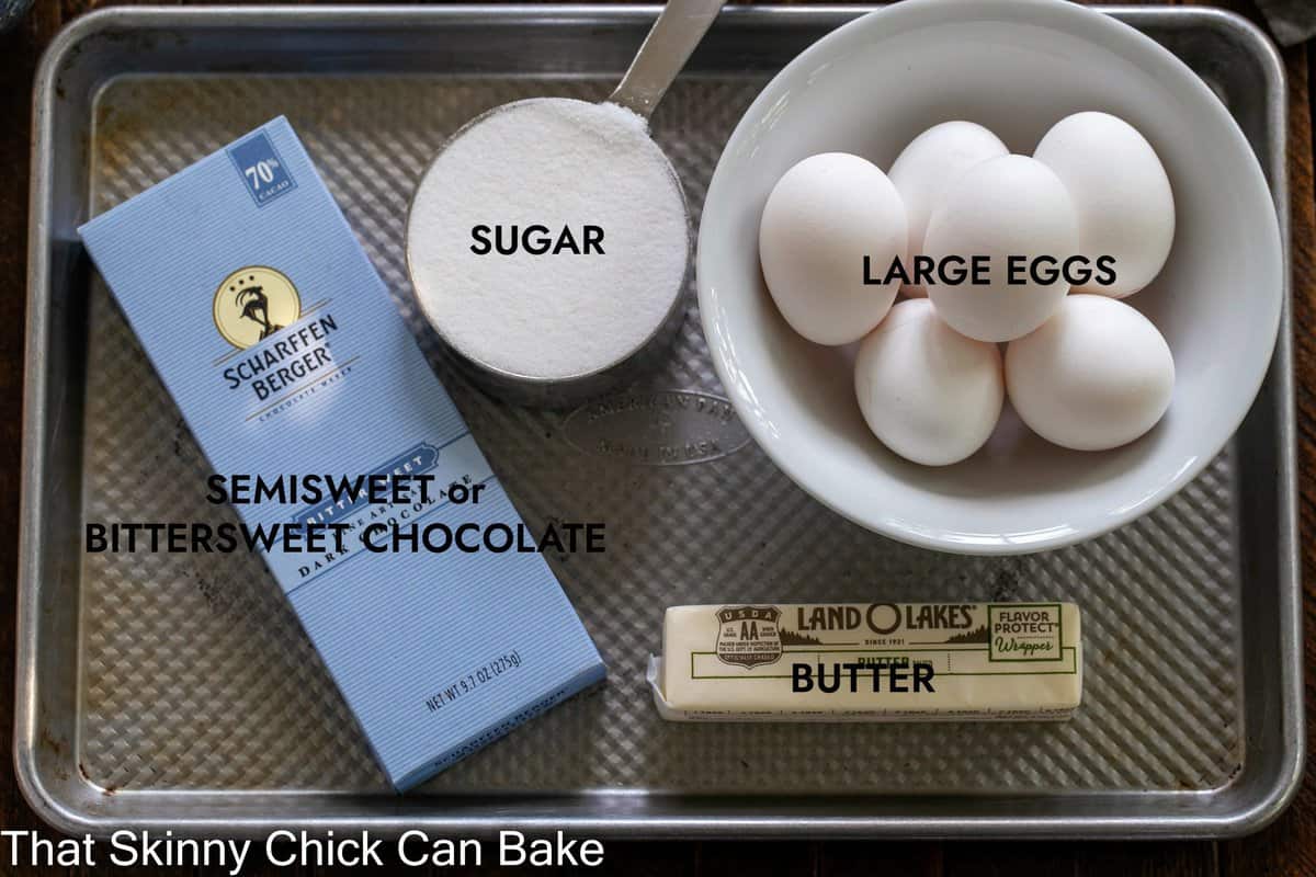 Labeled ingredients on a metal sheet pan.