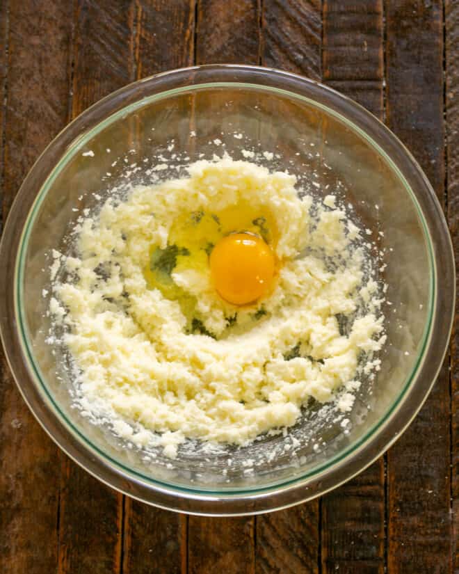 Butter mixture in bowl with egg.