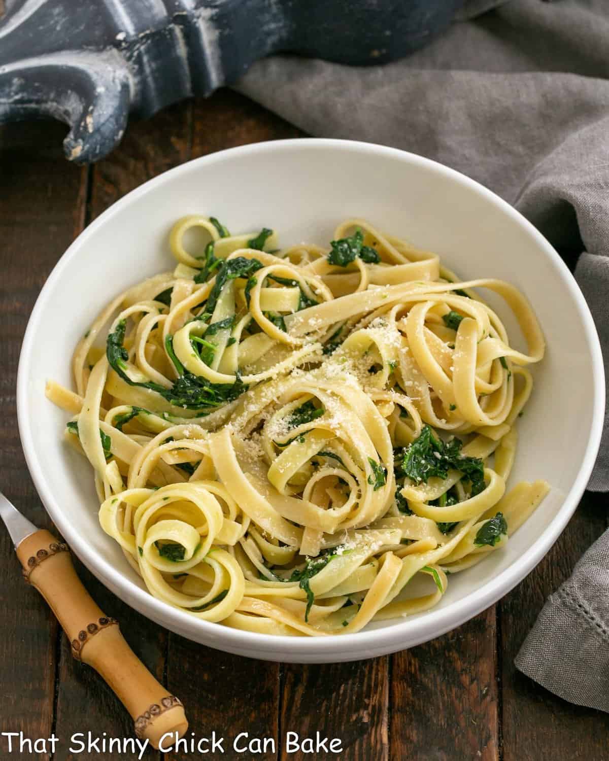 Overhead view of Fettuccine Pasta in a white serving bowl.