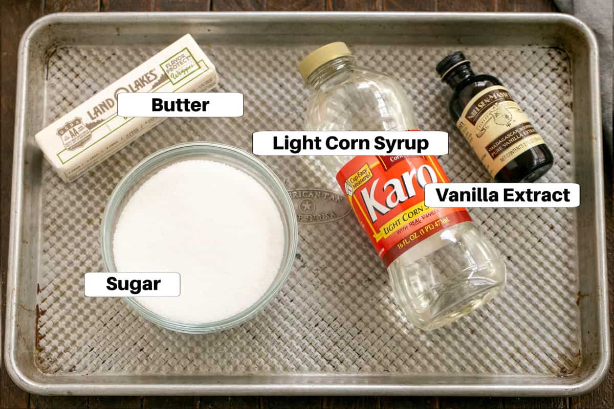 Sticky toffee pudding caramel sauce ingredients with labels on a sheetpan.