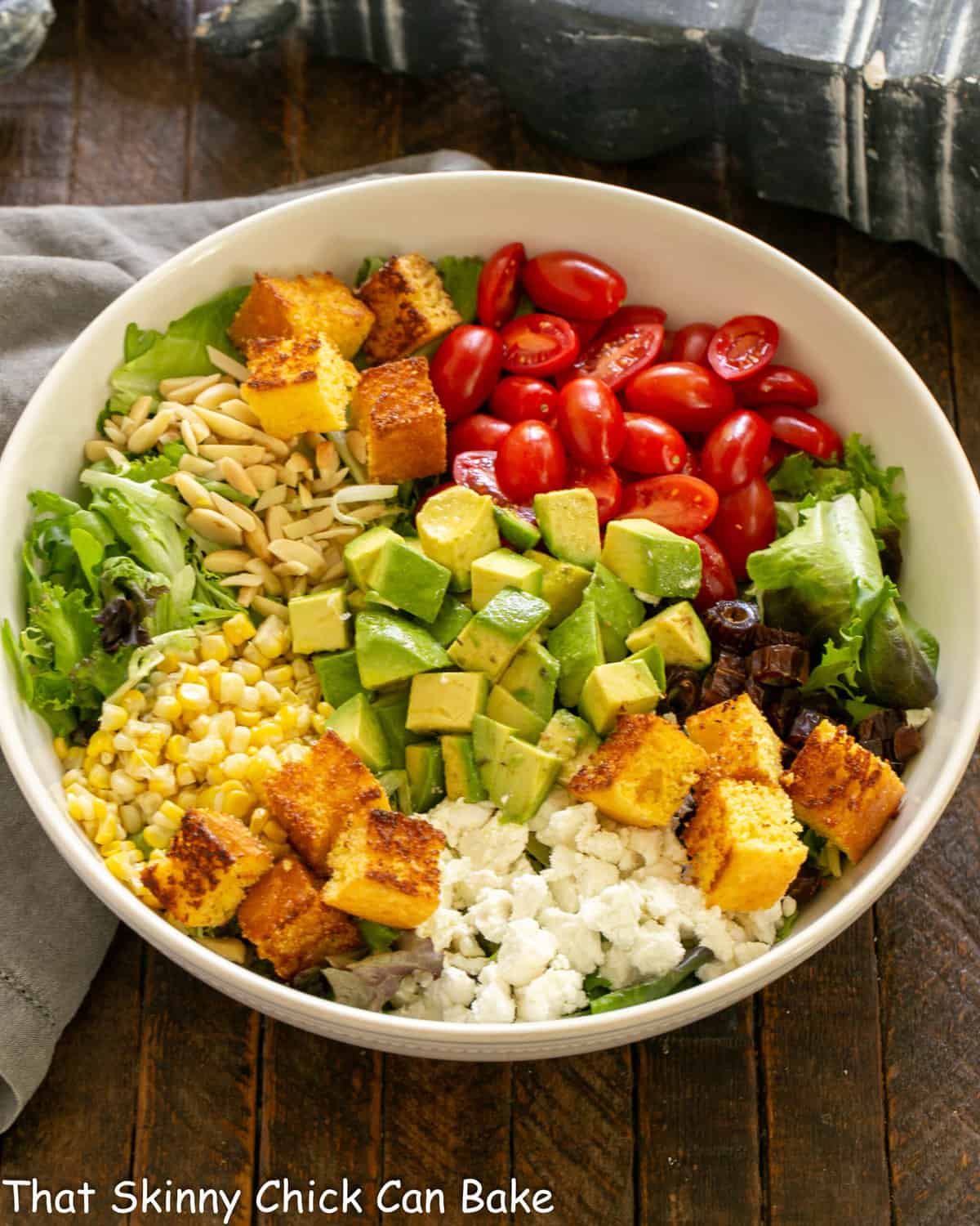 Macho Salad ingredients in a white serving bowl.