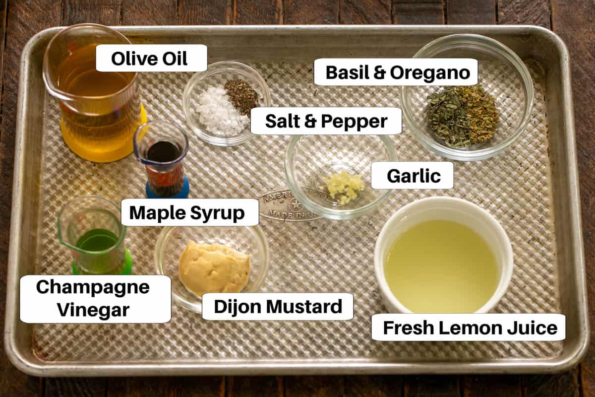 Macho Salad Dressing ingredients with labels on a sheet pan.
