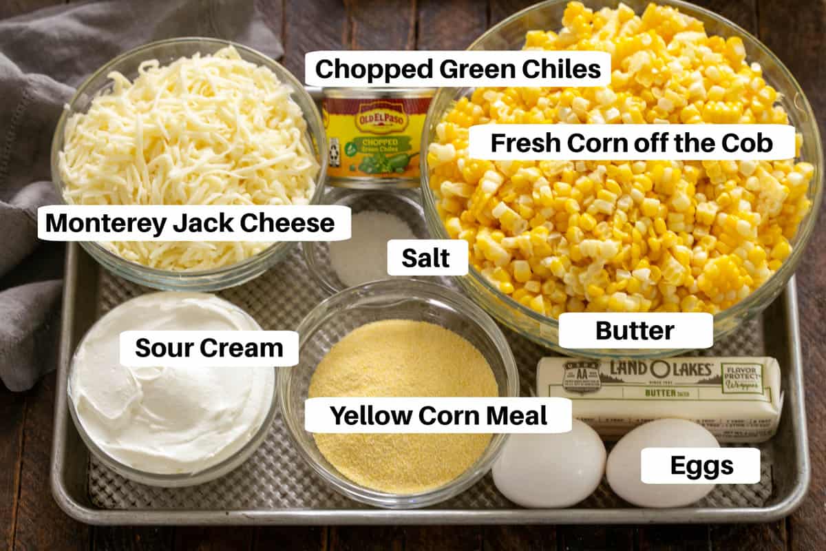 Corn Casserole Ingredients with labels on a metal sheet pan.
