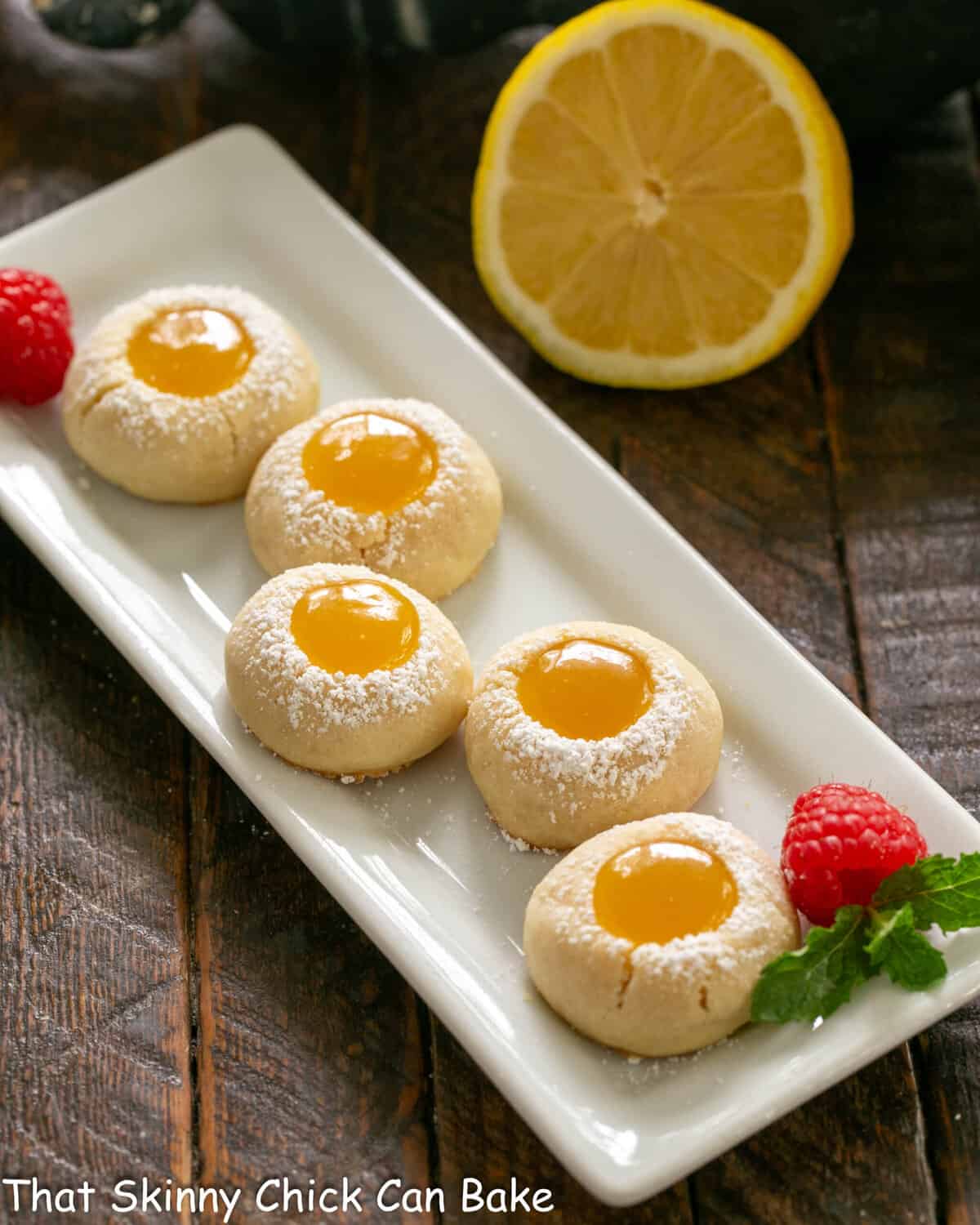 Lemon thumbprints on a white serving dish.