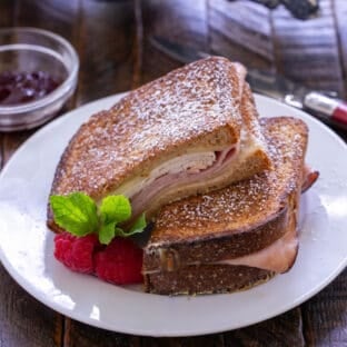 Monte Cristo Sandwich on a white lunch plate.