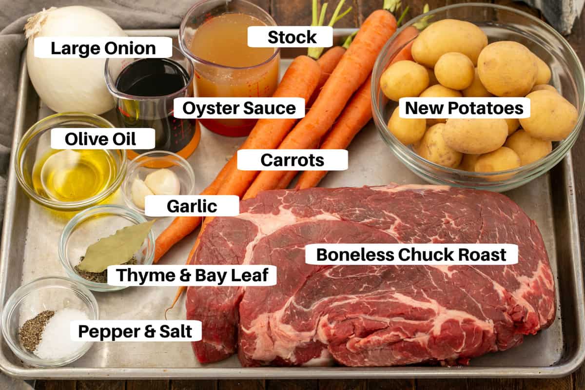 Pot Roast Ingredients with labels on a metal sheet pan.