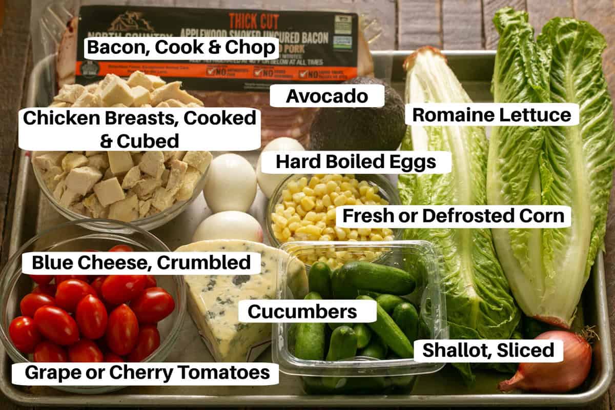 Cobb Salad Ingredients with labels on a metal sheetpan.