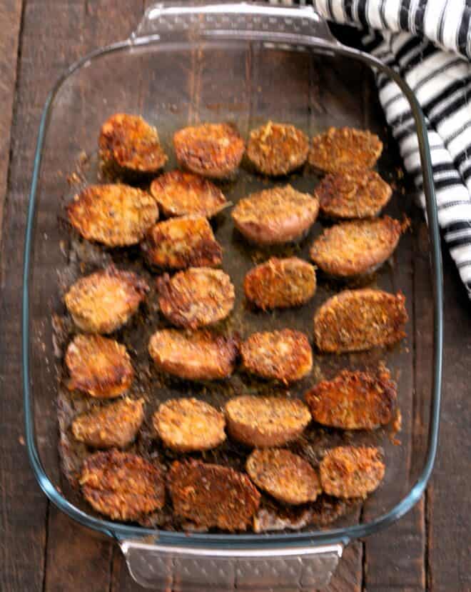 Potatoes added to butter mixture and roasted until golden.
